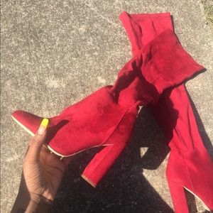 Red thigh high boots